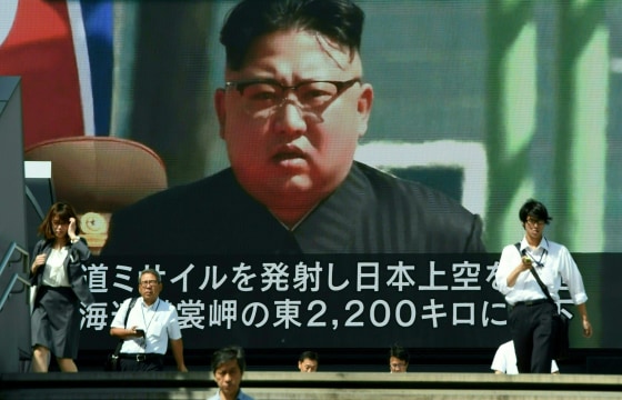 Image: Kim Jong Un's image on a video screen in Tokyo