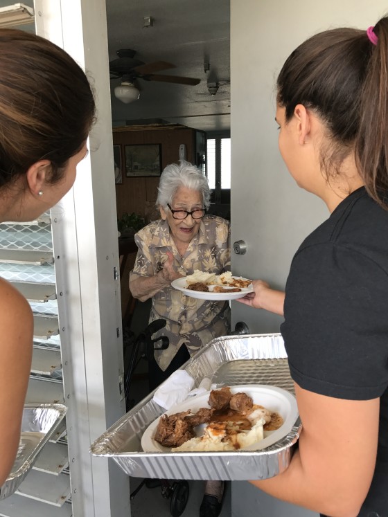 Volunteers deliver food to the elderly in Miami post hurricane Irma.