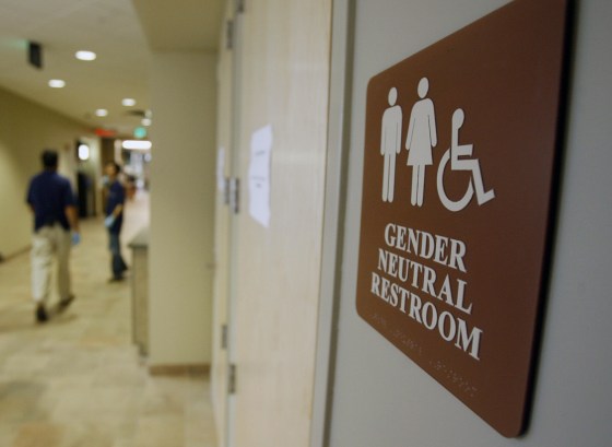 FILE - In this Aug. 23, 2007, file photo, a sign marks the entrance to a gender-neutral restroom at the University of Vermont in Burlington, Vt. 