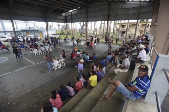 Image: People Queue to File FEMA Forms