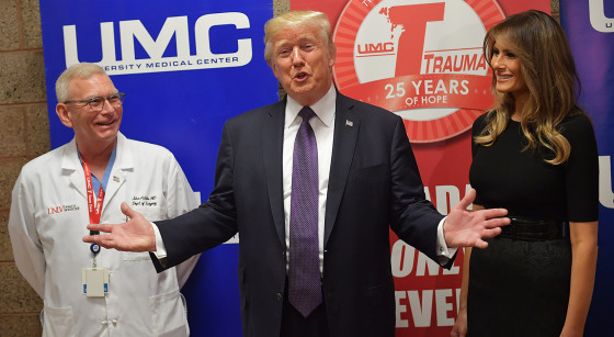 Image: President Donald Trump along with first lady Melania Trump speaks to the press after visiting with staff and shooting survivors at University Medical Center