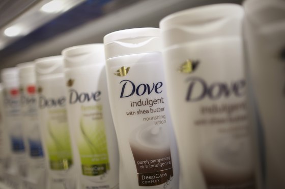 Image: Bottles of Dove body lotion.