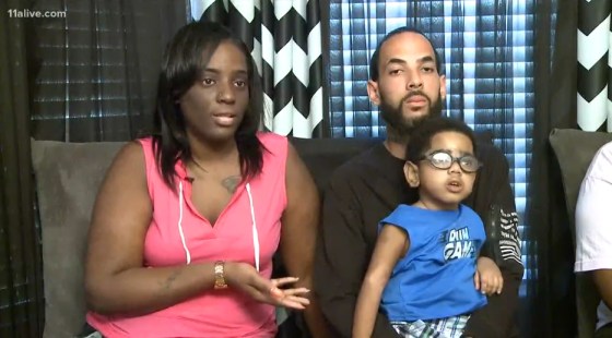 Carmella Burgess and Anthony Dickerson with their son, A.J.