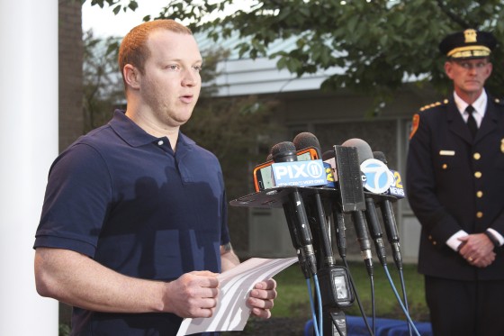 Image: New York City Police Officer Ryan Nash speaks to reporters