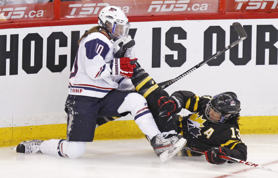 Image: Canada's Ouellette crashes into Chu of the US
