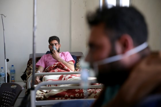 Image: A survivor of the Assad regime's suspected chemical attack in the Khan Shaykhun town of Idlib district, receives treatment at an hospital in Idlib, Syria on April 05, 2017.
