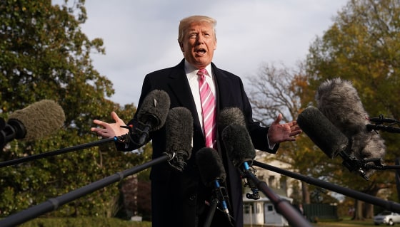 Image: President Donald Trump talks to reporters as he departs the White House