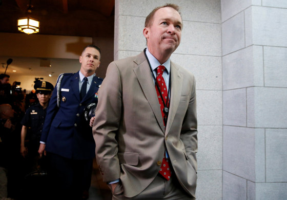 Image: U.S. Office of Management and Budget (OMB) Director Mick Mulvaney arrives with President Donald Trump
