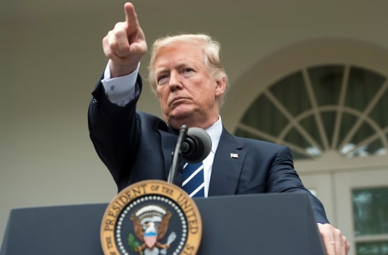 Image: President Donald Trump speaks to the press