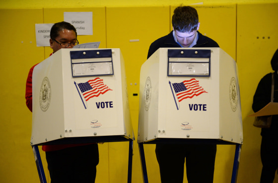 Image: Voters cast ballots in the 2016 U.S. presidential election