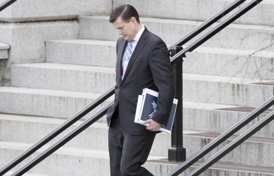 Image: Trump transition team member Rob Porter walks outside the Eisenhower Executive Office Building following meetings, at the White House complex in Washington, DC, Jan. 13, 2017.