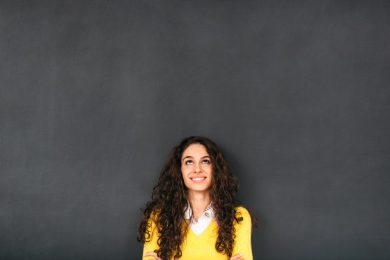 Image: Woman In Front of Blackboard