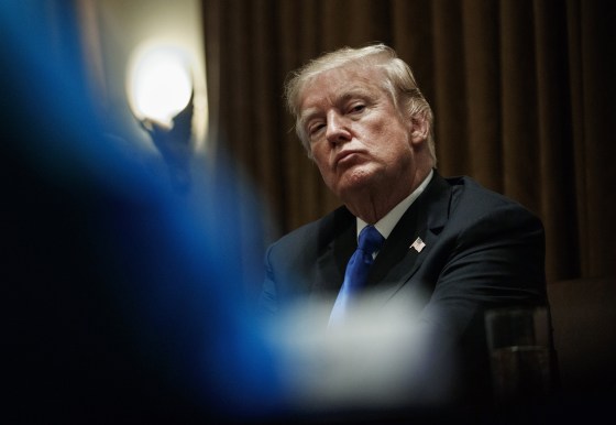 Image: President Donald Trump pauses during a meeting in the Cabinet Room