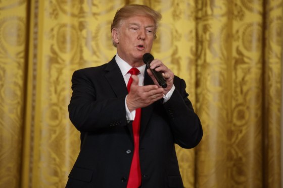 Image: Donald Trump attends opioid summit