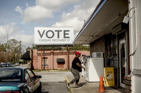 Image: A sign posted up by Vote.org, a non-partisan organization aiming to increase voter turnout and engagement, stands on Florida Street