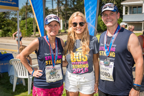 Image: Gillian Reny and her parents at the Boston Marathon.