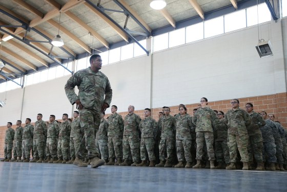 Image: Members of the Texas National Guard wait for Governor Abbott to speak about security on the Mexico-U.S. border in Weslaco