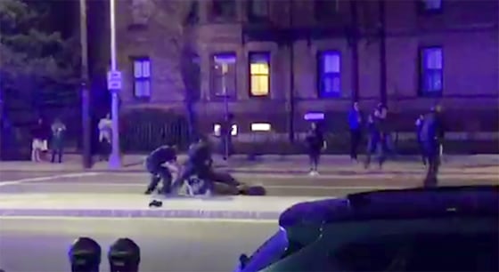 Image: Cambridge Police tackle Harvard Student