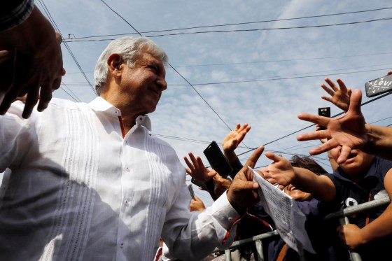 Image: Leftist front-runner Andres Manuel Lopez Obrador of the National Regeneration Movement (MORENA) greets supporters during his campaign rally in Mexico City