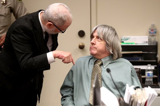 Image: David Allen Turpin talks with his attorney David Macher as he makes a court appearance in Riverside, California