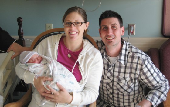 Image: Tara and Ryan Hansen with their son Brandon