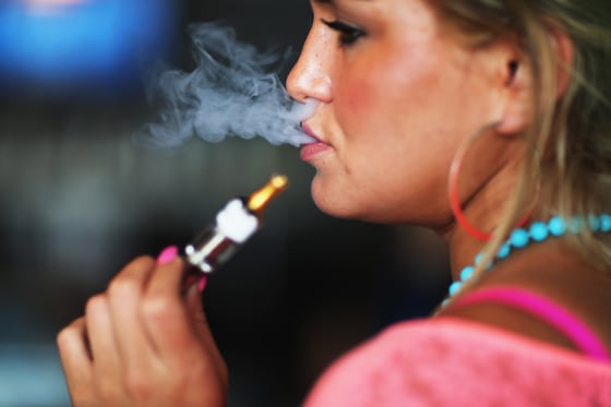 Image: Woman smoking electronic cigarette