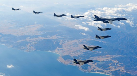 Image: U.S. Air Force B-1B bomber flies in formation during a joint aerial drill between the U.S and South Korea