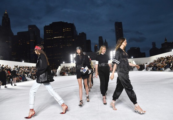 Image: Models walk the runway at the Alexander Wang Collection 1 show at Pier 17 in New York