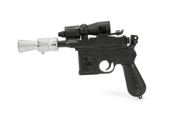 Han Solo's BlasTech DL-44 blaster from the Star Wars trilogy film "Return of the Jedi" in 1983 sold for $550,000 at Julien's Auctions Hollywood Legends sale Saturday night in Las Vegas.