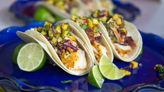 Blackened Fish Tacos with Bourbon-Bacon Slaw and Peach Salsa