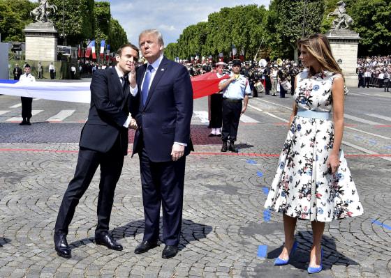 Image: French President Emmanuel Macron shakes hands with President Donald Trump