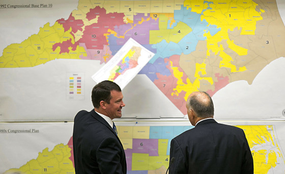 Republican state Sens. Dan Soucek, left, and Brent Jackson review historical maps during a meeting of the redistricting committee in 2016 in Raleigh, North Carolina.