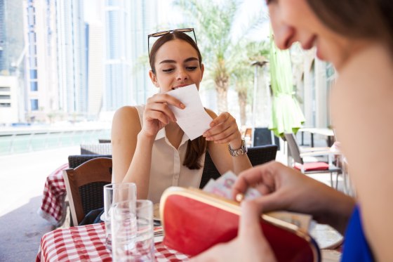 Image: Paying the check at the restaurant