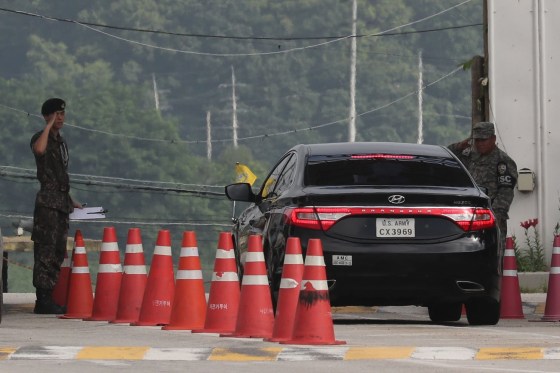 Image: A vehicle arrives at a checkpoint on Togil bridge leading to Panmunjom