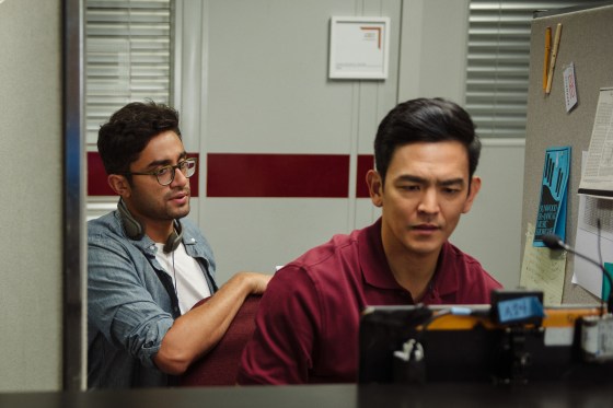 Director/writer Aneesh Chaganty on the set of \"Searching\" with star John Cho