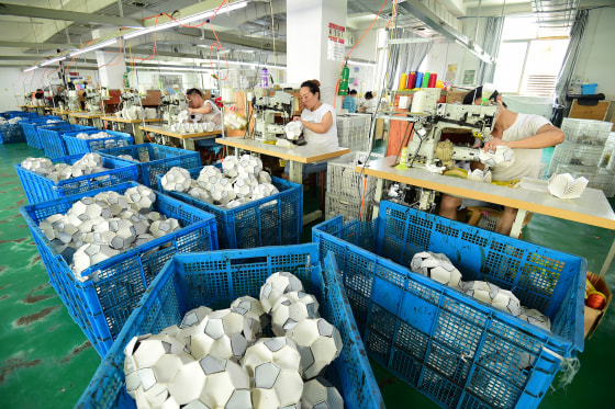 Workers Process Additional Football Orders From Overseas Customers In Yiwu