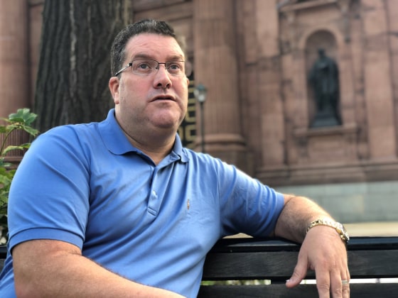 Image: Catholic priest abuse victim Mike McDonnell speaks in front of the Cathedral Basilica of Saints Peter and Paul in Philadelphia