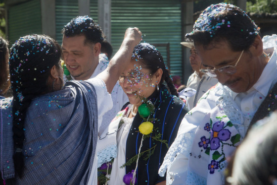 Image: Patricia Hernandez and other newly elected council members march towards the inauguration where they are received with celebratory confetti.