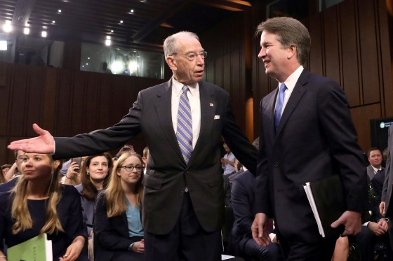 Image: U.S. Supreme Court nominee judge Brett Kavanaugh arrives with Judiciary Committee Chairman Sen. Chuck Grassley on Capitol Hill in Washington