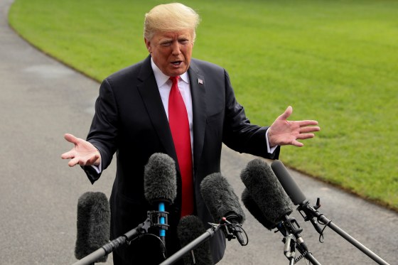 Image: U.S. President Trump talks to reporters as he departs the White House for travel to Florida in Washington