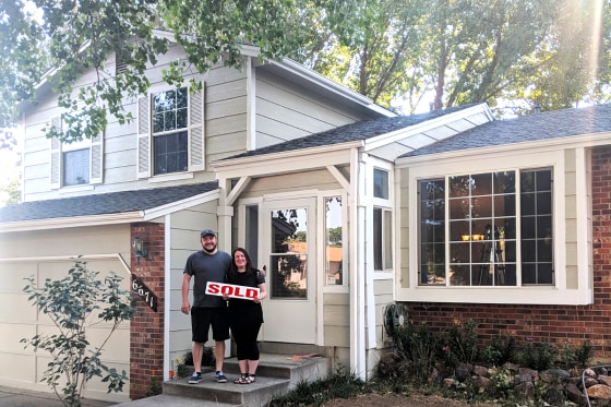 Carrie S. Nicholson and her husband Ryan the day they closed on their new home.