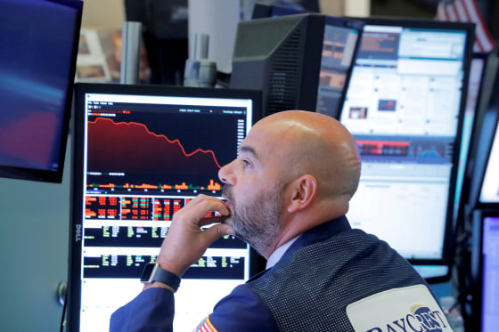 Image: A trader works on the floor of the New York Stock Exchange (NYSE) in Manhattan in New York