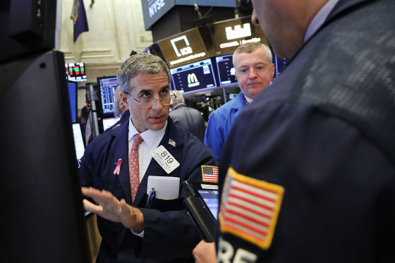 Image: Traders work on the floor of the New York Stock Exchange (NYSE) on the morning of Oct. 11, 2018 in New York City
