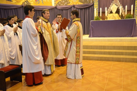 Image: Priest Carlos Urrutigoity celebrates Mass