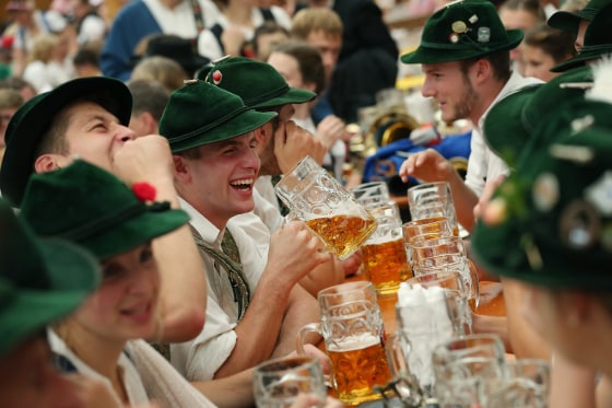 Members of a traditional Bavarian marching band drink beer during Oktoberfest on Sept. 23, 2018 in Munich, Germany.