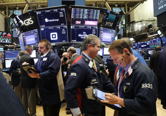 Traders work on the floor of the New York Stock Exchange (NYSE) on Oct. 15, 2018.