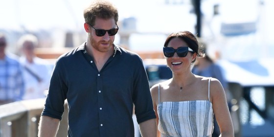 Pregnant Meghan Markle cradles baby bump wear Reformation sundress