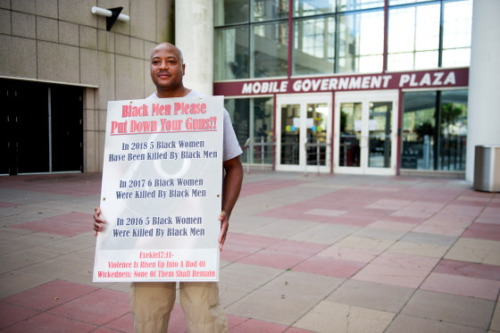 John Young, an Alabama police officer who is spending his 'off duty' time advocating for black women who are victims of domestic violence.