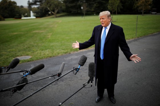 President Donald Trump talks to reporters on the South Lawn of the White House