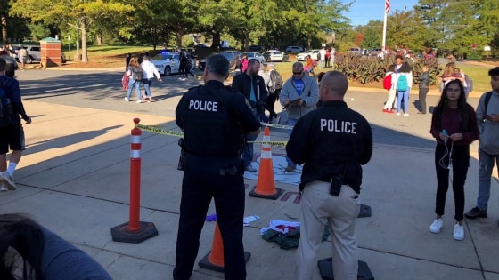 Police respond at the scene of a shooting at Butler High School in Matthews, North Carolina.